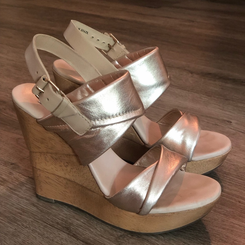 Diane von Furstenberg wood wedge; gold leather upper. Hardly worn; size 7.